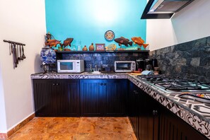 Fridge, microwave, stovetop, coffee/tea maker - Poolside suite in Punta Sur (Isla Mujeres)