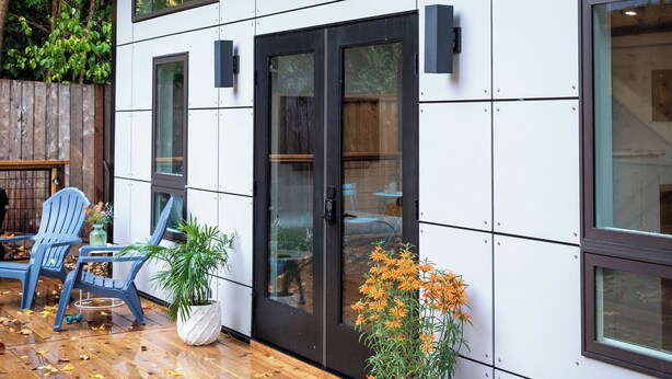 A modern house with large windows, a wooden deck, and a potted plant. - Hilldale Studio - in the heart of Marin County (San Anselmo)