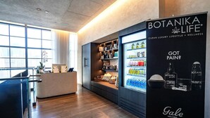 A modern wellness store with a large display of Botanika Life products. - New Luxury Condo in Downtown (Miami)