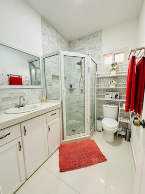 Hair dryer, towels, soap, toilet paper