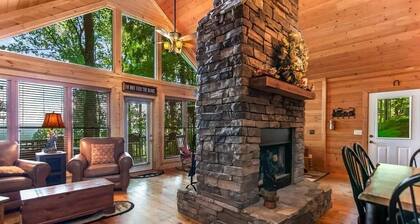 Mountain top cabin with big views, a relaxing hot tub and 2 gas fireplaces.