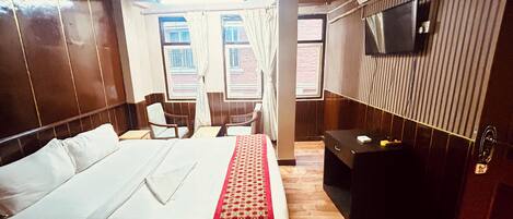 Desk, laptop workspace, free WiFi, bed sheets