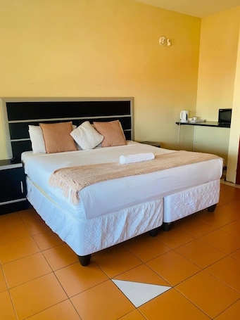 Luxury Double Room, City View, Poolside | Desk, laptop workspace, iron/ironing board, free WiFi