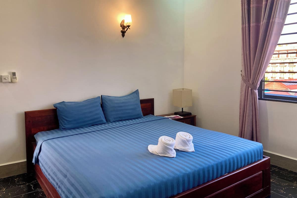 Basic Double or Twin Room, City View | Minibar, in-room safe, desk, laptop workspace