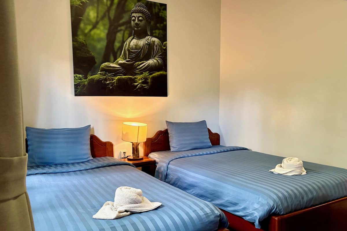 Deluxe Twin Room, Non Smoking, Pool View | Minibar, in-room safe, desk, laptop workspace