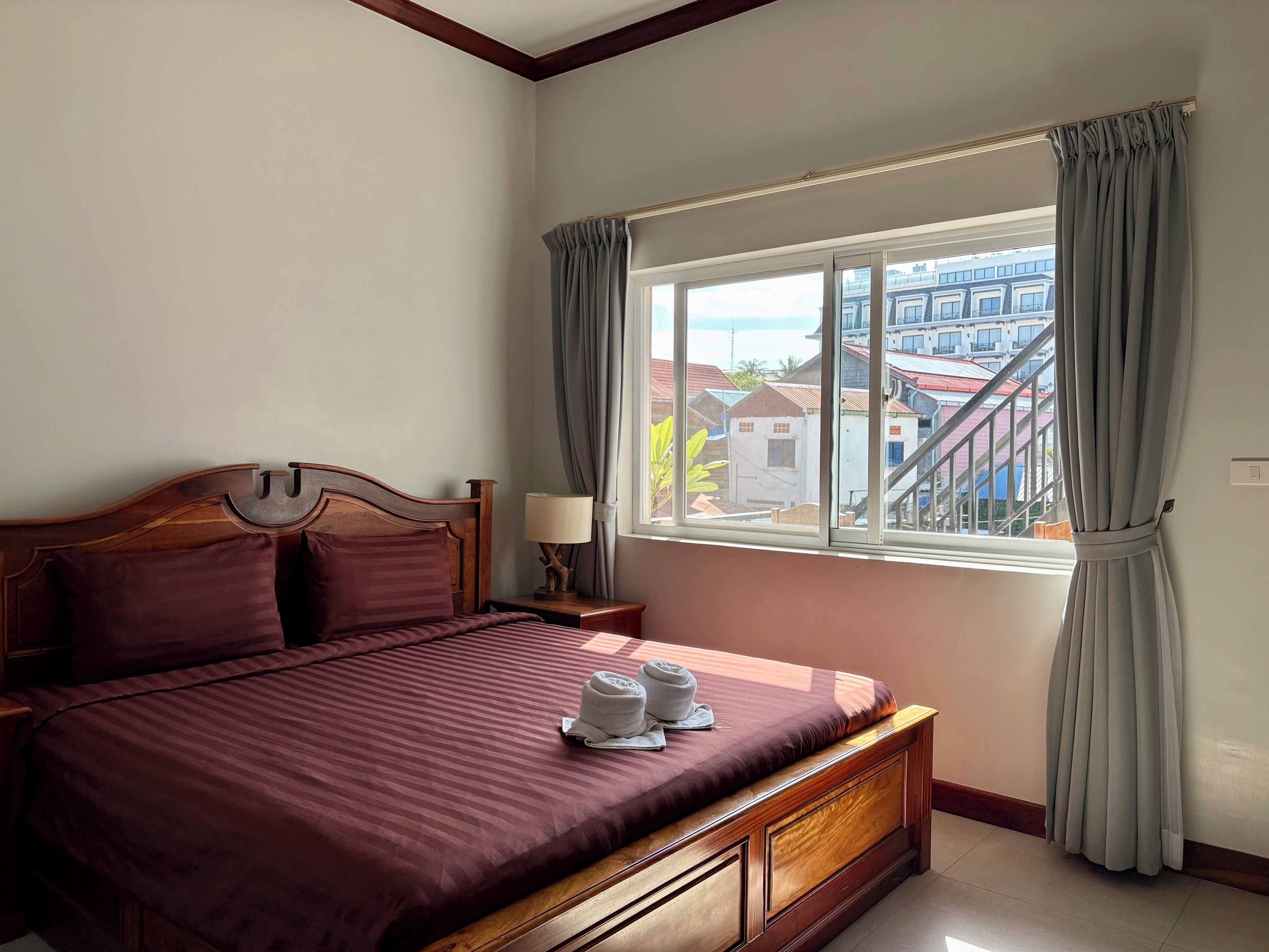 Economy Double Room, Courtyard View | Minibar, in-room safe, desk, laptop workspace