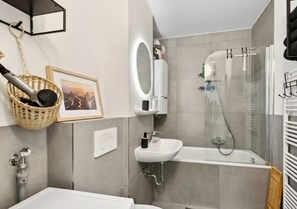 Hair dryer, towels, soap, shampoo