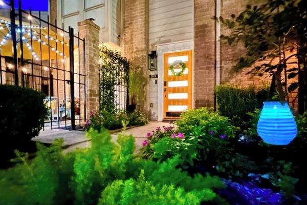 Welcome! The front entrance welcomes you with lush landscaping!