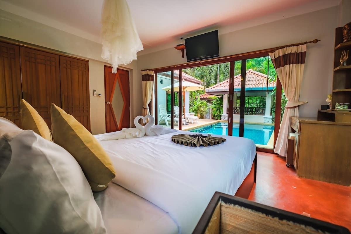 Luxury Suite, Pool View | 3 bedrooms, desk, laptop workspace, free WiFi
