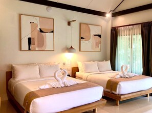 Deluxe Quadruple Room, Beach View | Desk, laptop workspace, free WiFi