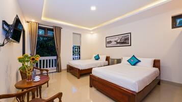 Family Room, Balcony, Garden View | Premium bedding, minibar, desk, blackout curtains