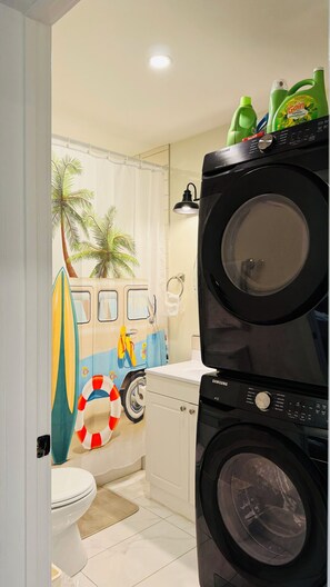 Hair dryer, towels, soap, shampoo