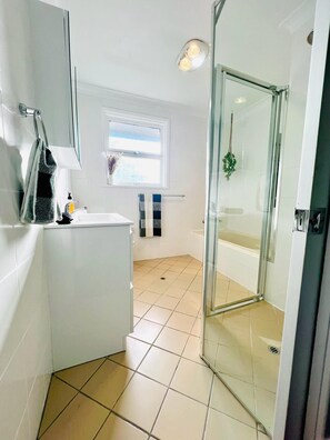 Hair dryer, towels, soap, shampoo