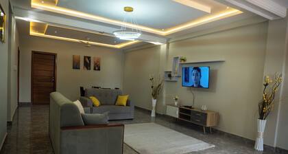 2 bedrooms apartment, 4 guests, Starlink WiFi, DSTV, Netflix, free parking
