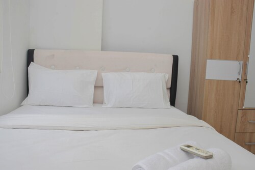 Cozy Style 2BR at Green Pramuka City Apartment