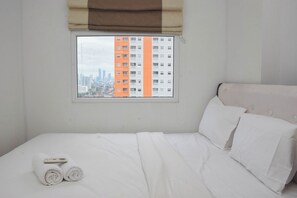Deluxe Apartment (queenbed) | 2 bedrooms, bed sheets - Cozy Style 2BR at Green Pramuka City Apartment (Jakarta)
