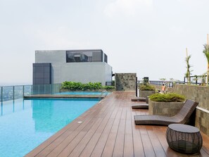 Outdoor pool - Minimalist and Serene 1BR at Bintaro Embarcadero Apartment (South Tangerang)