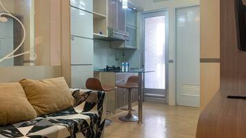 Apartemen Deluks (queenbed) | Ruang keluarga