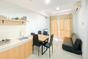 Apartemen Deluks (queenbed) | Area keluarga