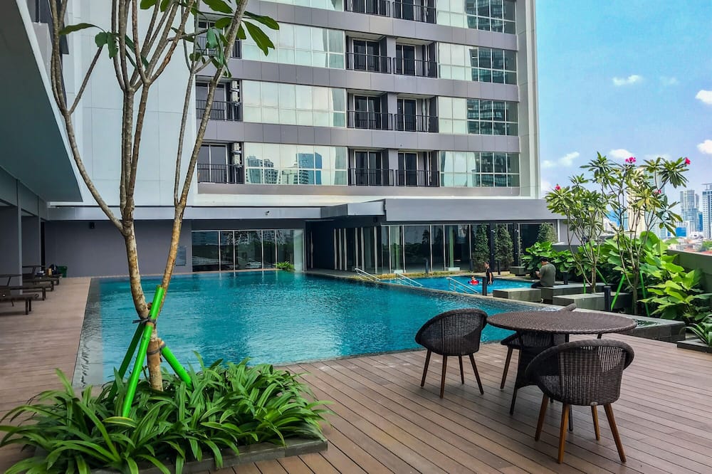 Homey and Warm 1BR at Ciputra World 2 Apartment
