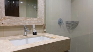 Deluxe Studio (queenbed) | Bathroom | Shower, free toiletries, towels - Homey and Good Studio at H Residence Apartment (Jakarta)