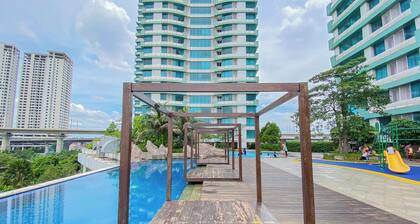 Homey and Restful Studio Grand Kamala Lagoon Apartment