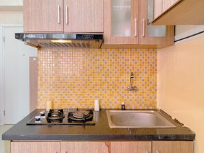Deluxe Apartment (twin) | Private kitchen - Good and Warm 2BR at Green Pramuka City Apartment (Jakarta)