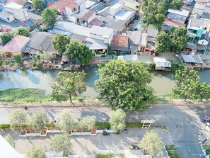 Stroll along the river's edge, taking in the sights and sounds of the city's tranquil atmosphere.