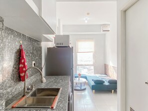 Deluxe Apartment (queenbed) | Private kitchen - Good Place and Restful 2BR at Patraland Urbano Apartment (Bekasi)