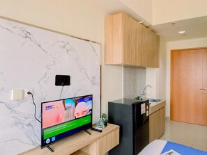 Interior - Comfy and Minimalist Studio Apartment at Evenciio Margonda (Depok)