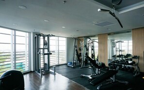 Work out in a well-equipped gym with weight machines, free weights, and cardio equipment.
