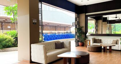 Modern Look and Restful Studio at Azalea Suites Apartment
