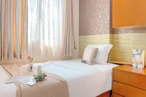 Apartemen Deluks (twin) | 2 kamar tidur, Wi-Fi gratis, dan seprai linen