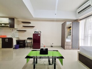 Estudio Deluxe (kingbed) | Zona de estar