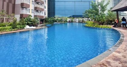 Restful and Comfy Studio Podomoro City Deli Medan Apartment