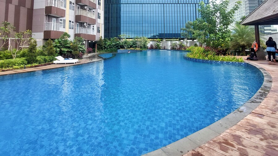 Restful and Comfy Studio Podomoro City Deli Medan Apartment