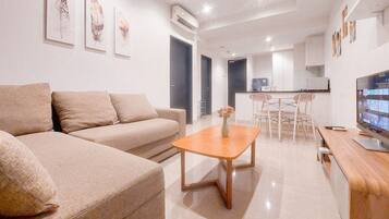 Departamento Deluxe (kingbed) | Área de sala de estar