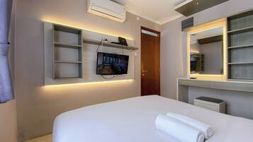 Apartemen Deluks (queenbed) | 2 kamar tidur, Wi-Fi gratis, dan seprai linen