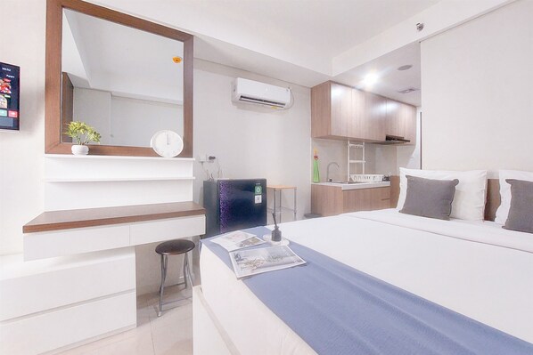 Estudio Deluxe (queenbed) | Tabla de planchar con plancha, wifi gratis y ropa de cama 