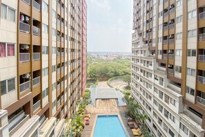 Deluxe Studio (queenbed) | View from room - Cozy and Warm Studio at LRT City Jatibening Apartment (Bekasi)