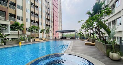 Cozy and Warm Studio at LRT City Jatibening Apartment