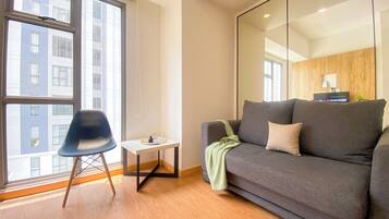 Departamento Deluxe (queenbed) | Área de sala de estar