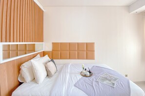 Deluxe Studio (twin) | Free WiFi, bed sheets - Good Deal and Comfy Studio at Transpark Cibubur Apartment (Depok)