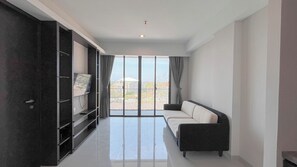 Deluxe Apartment (twin) | Living area - Exclusive 2BR Apartment (No Kitchen) with Balcony at Skales Residence Nusa Dua Bali (Nusa Dua)