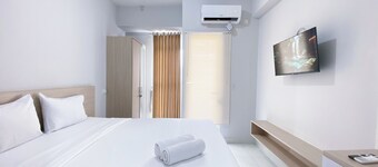 Minimalistic and Cozy Studio Amartha View Apartment