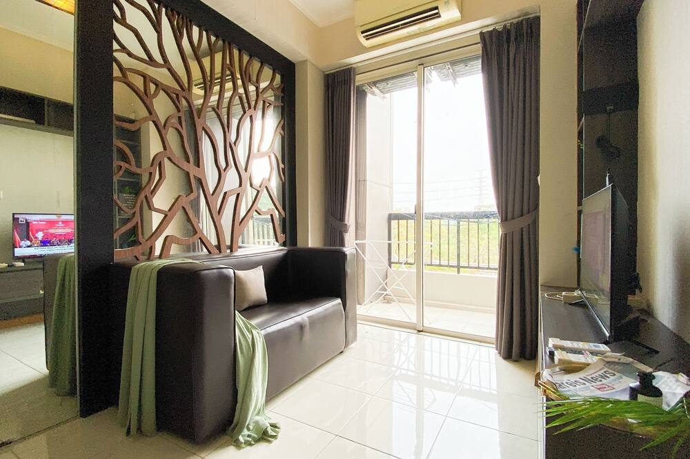 Modern Look 1BR Apartment at Silkwood Residence