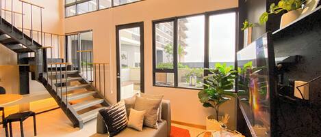 ดีลักซ์อพาร์ทเมนท์ (queenbed) | บริเวณนั่งเล่น