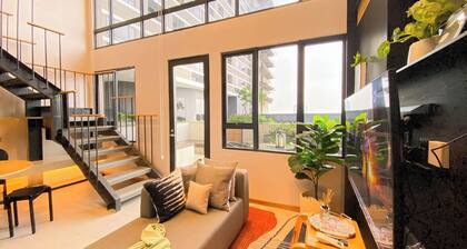 Elegant 2BR Loft Garden Villa at Collins Boulevard Apartment