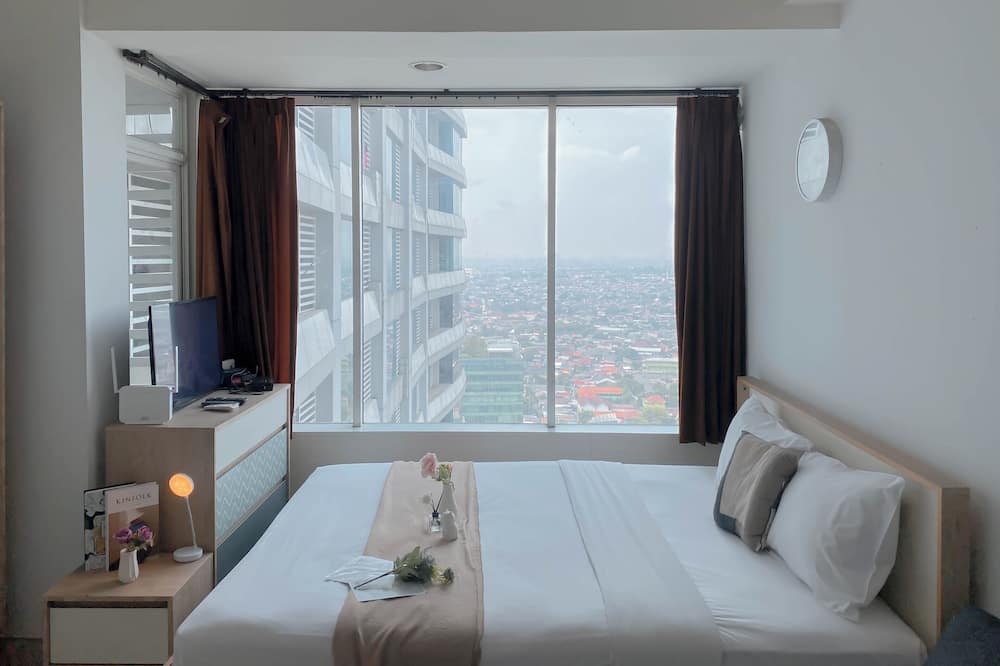 Cozy and Best Deal Studio at Grand Kamala Lagoon Apartment