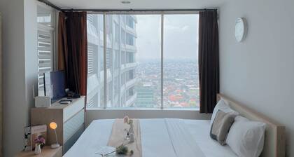 Cozy and Best Deal Studio at Grand Kamala Lagoon Apartment